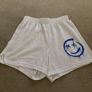 SOFFE White Shorts with Blue Drippy Smiley Face with X Eyes